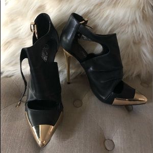 Black and gold heels
